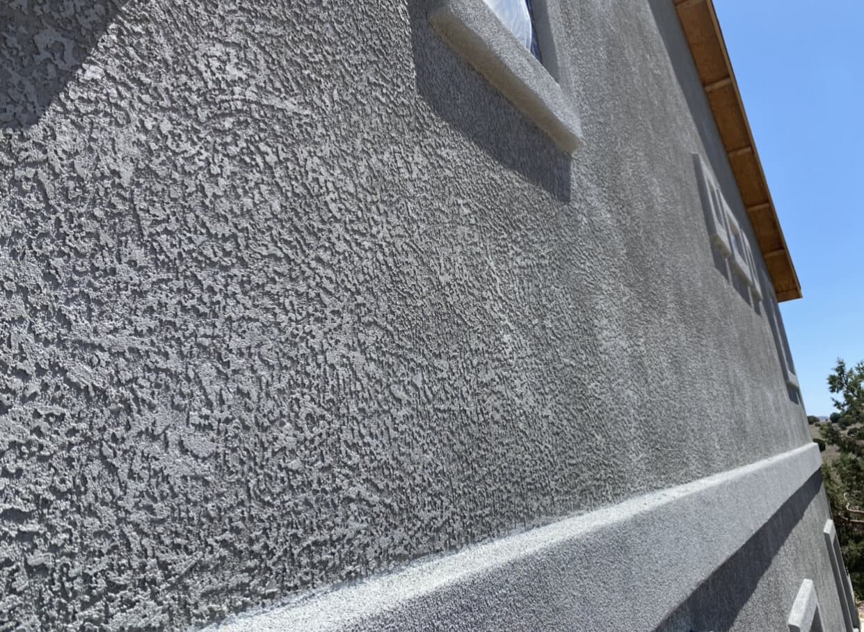 A stucco finish coat, troweled by hand